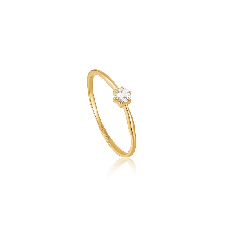 Ania Haie’s Luxurious 14kt Gold Band Ring with Pristine White Sapphire